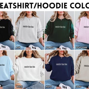 Puede incluir: Una selecci&oacute;n de sudaderas y sudaderas con capucha en varios colores, incluyendo negro, ceniza, verde bosque, rosa claro, azul claro, blanco, azul marino y arena. Cada sudadera muestra el texto "smuttier than thou".