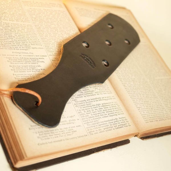 Punishment Paddle with Impact Holes in Thick Black Bridal Leather