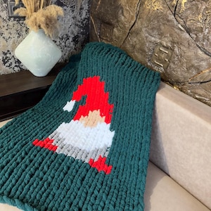 Knitting pattern for a Christmas gnome blanket Tutorial for finger knitting a thick knit blanket Christmas gnome diagram See other patterns