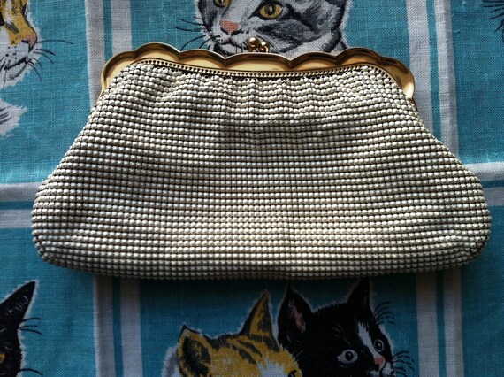 Whiting and Davis pearlescent mesh clutch.