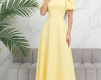 Vestido romántico amarillo limón: silueta clásica en línea A con mangas abullonadas para ocasiones especiales.
