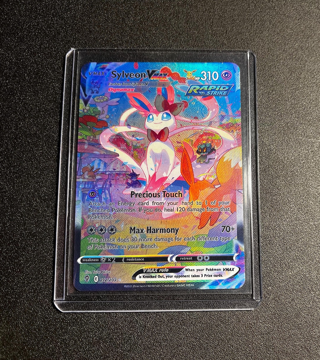 sylveon vmax pokemon card value - 075/203 - Ultra Rare - Sword & Shield When your Pokmon VMAX is Knocked Out Sylveon VMAX Evolving Skies #212