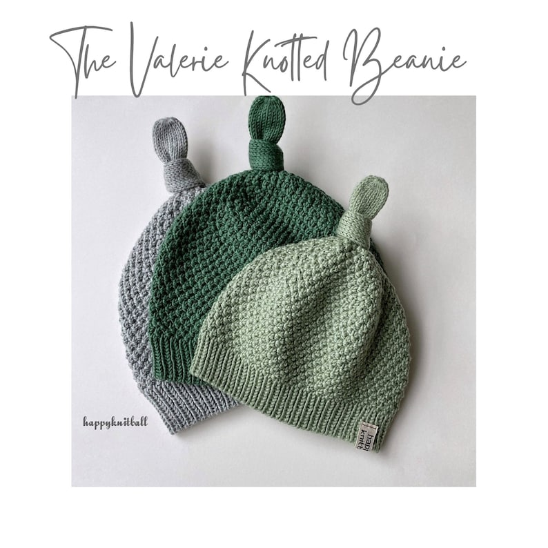 May include: Three knitted beanies labeled The Valerie Knotted Beanie, featuring a grey, a dark green, and a light green hat. Each beanie has a textured stitch pattern, a ribbed brim, and a top knot. A small tag reads happyknitball.