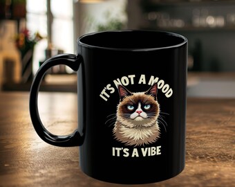 Taza de gato gruñón, no es un estado de ánimo, es una vibra, regalo divertido para amantes de los gatos, taza de cerámica negra (11 oz, 15 oz)