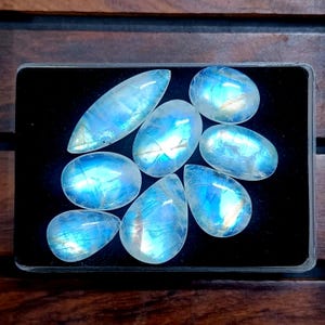 Rainbow Moonstone Cabochon Lot: Mixed Shape Gemstones (142.70 Carat Total)