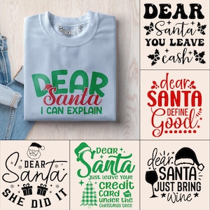 May include: A light blue sweatshirt with the text "DEAR Santa I CAN EXPLAIN" in green and red. The image also shows other Christmas-themed designs with text like "DEAR Santa YOU LEAVE cash" and "DEAR Santa JUST BRING wine".