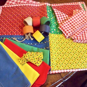 VINTAGE LINENS-Red & WhiTe gingham+ primary colors--2-44&quot;x44&quot; tablecloths,7 napkins,4 sewn and 6 wooden Napkin Rings,4 reversible pLacemats