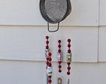 SALE--WIND CHIME REcycled from an antiQue wire STRAiNER And antiQue measuring spoons- + Red,Silver beads and 5 "tin can beads from Scotland"
