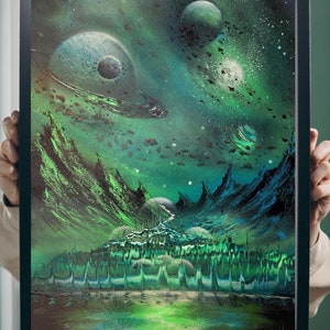 May include: A framed painting depicting a green and blue landscape with a city in the foreground. The sky is filled with stars and planets, including a large ringed planet in the top left corner.