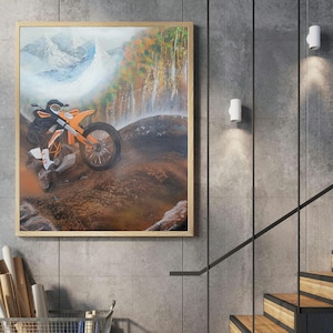 May include: A painting depicting an orange dirt bike in a mountainous landscape. The bike is partially obscured by a waterfall and a rocky cliff. The sky is blue and cloudy.