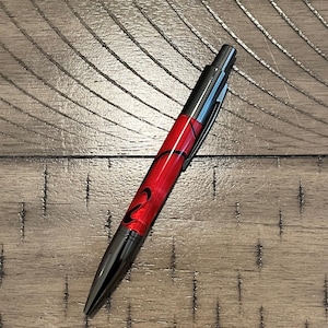 Rode en zwarte werveling acryl klikpen