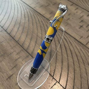 Gele en blauwe acryl Swirl kattenpen