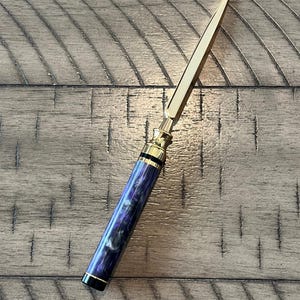 Lila Sparkle Swirl Brieföffner