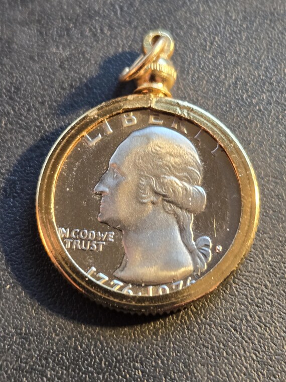 Proof bicentennial quarter 1976-S in gold colored bezel