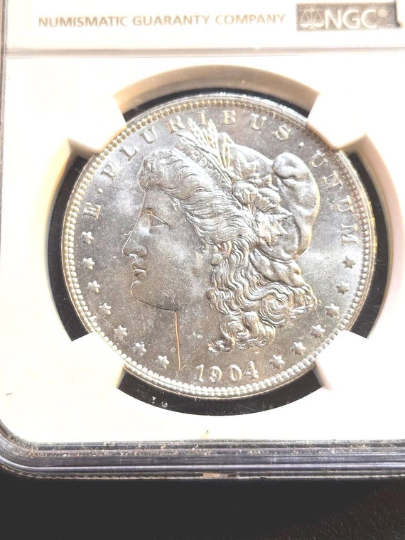 1904 New Orleans Mint Morgan Silver Dollar MS63 NGC Certified