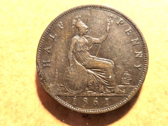 1861 Great Britain 1/2 Penny Crushed Rim