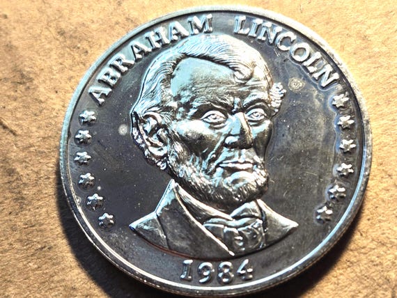 Abraham Lincoln Silver-Colored Coin Medallion