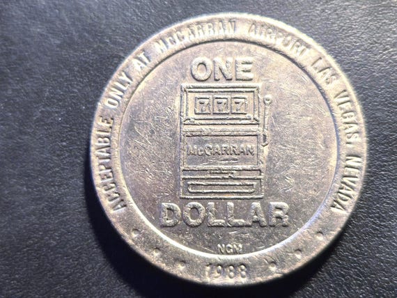 1988 McCarran Airport Slots Las Vegas Nevada One Dollar Gaming token 37MM