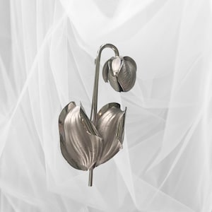 Silver 925 sterling brooch.  A classiscal design of a Ladies slipper Orchid Designed and Manufactured by Boyd Bond