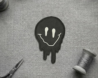 Preppy meltin smiley face embroidered patch. Smiley face embroidered patch.