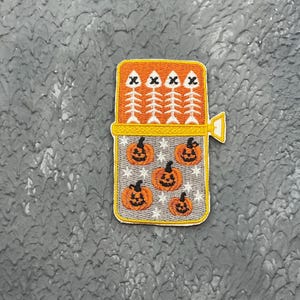 Sardine Halloween embroidered patch. Fish skeletons iron on or hook and loop patch.