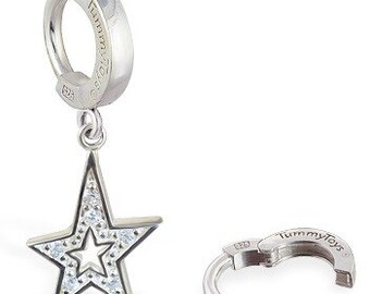 May include: Silver body piercing with a star-shaped charm. The star is encrusted with clear rhinestones.