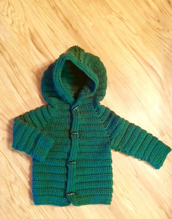 green sweater baby boy