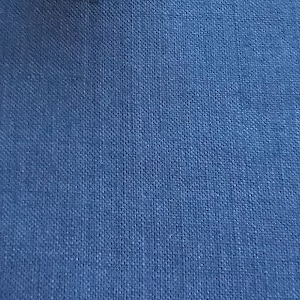 May include: A solid dark blue fabric with a visible woven texture. The material features a consistent grid-like pattern created by the interlacing of horizontal and vertical threads, resulting in a matte finish across the entire surface.