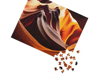 Könnte beinhalten: Ein Puzzle mit einem Nahaufnahmebild eines Canyons mit wirbelnden orangefarbenen, braunen und schwarzen Felsformationen. Das Puzzle ist teilweise zusammengesetzt, einige Teile fehlen.