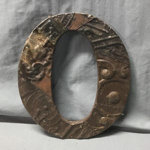 May include: A rustic wooden sign with the text "Welcome to our home" in white lettering. The sign features a distressed finish and a simple, inviting design, perfect for entryway decor.