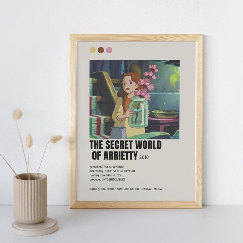 May include: A minimalist movie poster for the animated film "The Secret World of Arrietty". The poster features a young girl with brown hair holding a jar of flowers. The poster is in a light brown frame.