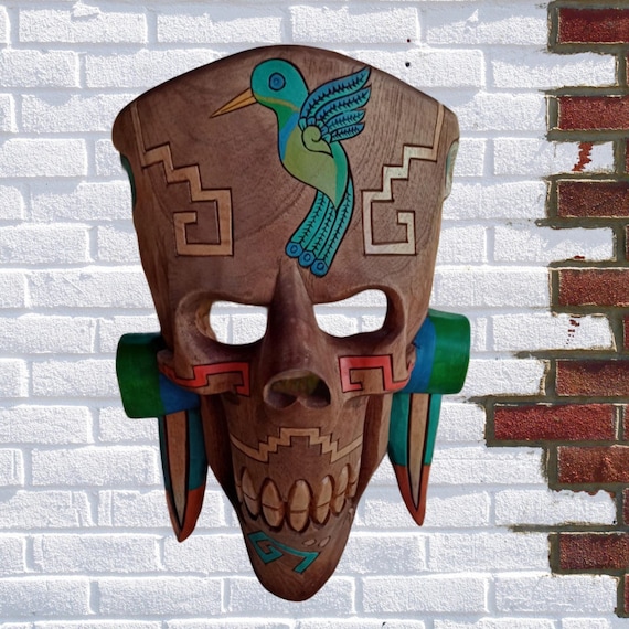 Mayan wooden skull mask.