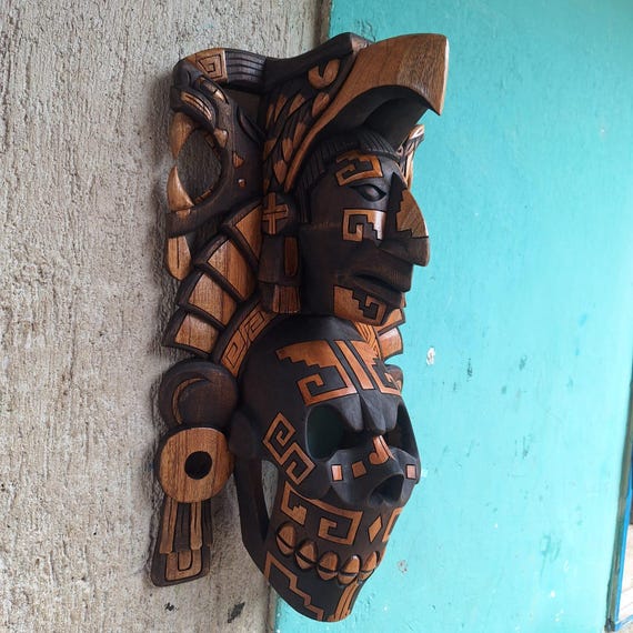 Hand Carved mask made of cedar wood, Mayan and Aztec culture, Mexican art