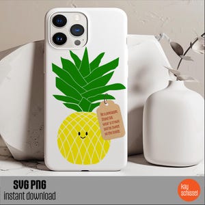May include: A white phone case with a pineapple design. The pineapple is green and yellow with a smiling face. The text on the case reads "Be a pineapple Stand tall wear a crown and be sweet on the inside".