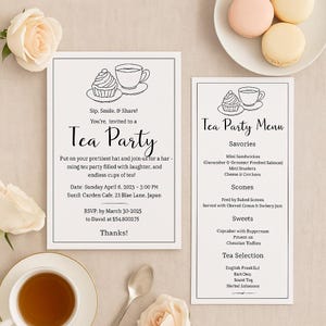 May include: Two white invitation cards with black text for a tea party, featuring a cupcake and teacup illustration. The menu card lists savories, scones, and sweets. A teacup, spoon, and macarons are also visible.