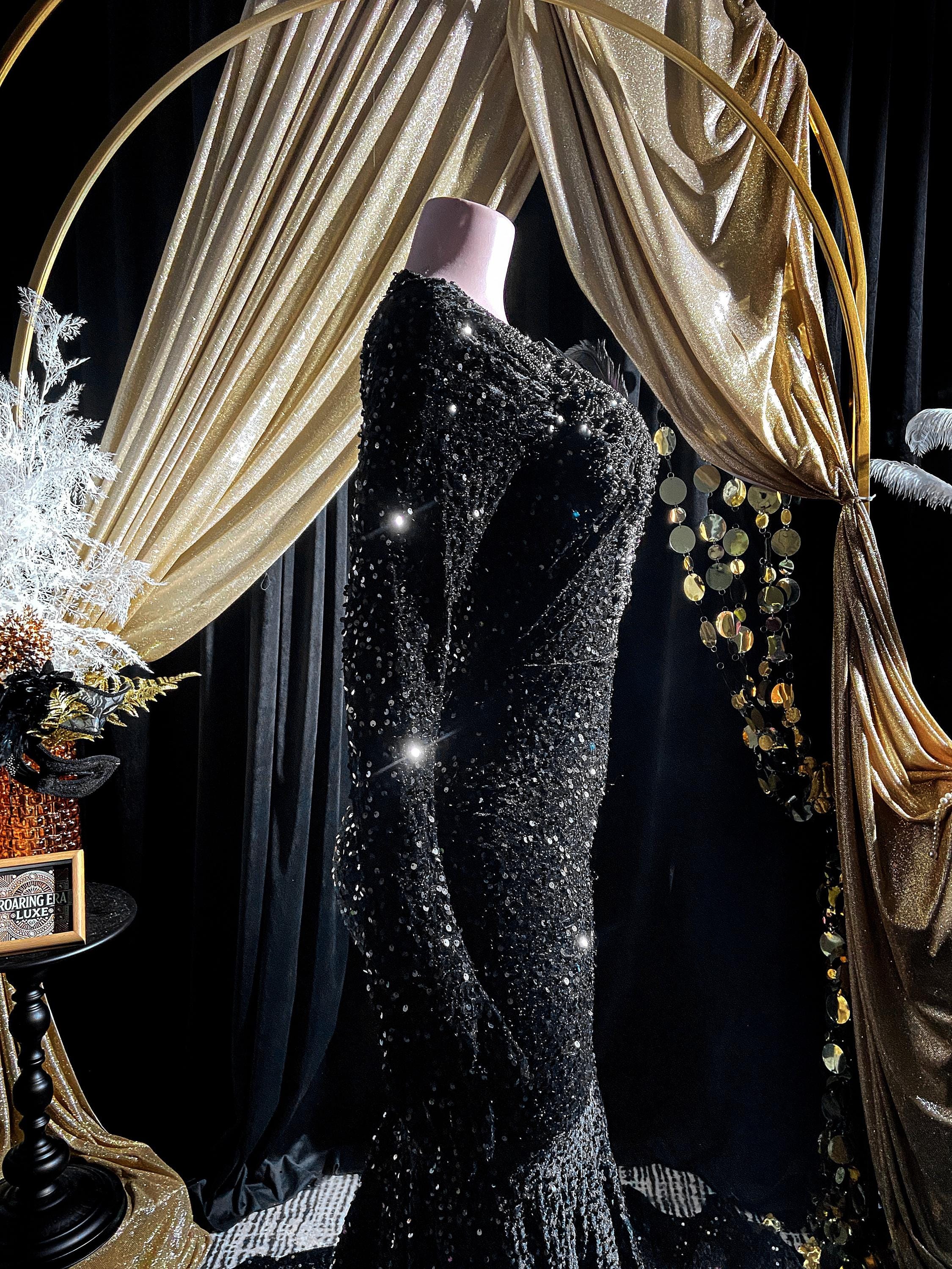 stunned by you black rhinestone mermaid maxi dress Share with a friend who would own the spotlight in this black beaded mermaid gown! To