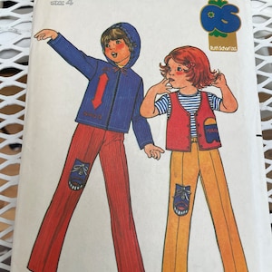 May include: Vintage Butterick sewing pattern 6722, size 4. The cover features illustrations of children's clothing: a blue hooded jacket and red pants, and a red vest with yellow pants. The pattern includes the text "Quick! Butterick".