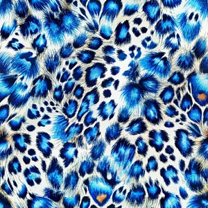 Puede incluir: Tela de estampado animal azul y blanco con textura peluda. El estampado se asemeja a un patrón de leopardo o guepardo.