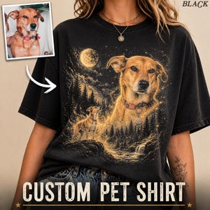 May include: Black t-shirt featuring a custom pet portrait design. The graphic depicts a dog with a full moon and forest scene. The words "CUSTOM PET SHIRT" are printed at the bottom. The shirt has a vintage, distressed look.
