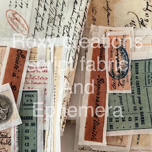 May include: A collection of vintage fabric scraps with handwritten text and labels. The scraps are in various shades of brown, beige, and green. Some of the labels include the text "Soci&eacute;t&eacute; &agrave; R", "Responsabile", and "Savon et Cr&egrave;mes pour la Barbe".