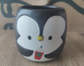 Taza Starbucks® con diseño de pingüino - Blanca - 296 ml - 10 oz TAZA BLANCA Pingüino
