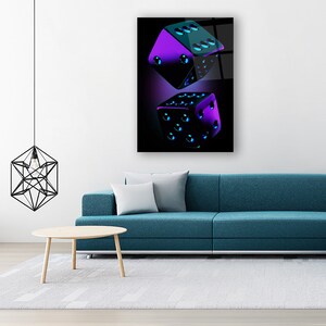 May include: Two purple and blue dice with black dots on a black background.