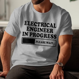 May include: A gray t-shirt with the text "Electrical Engineer in Progress" and a progress bar that says "Please Wait..."