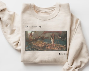 Könnte beinhalten: Beiges Sweatshirt mit einem gerahmten Bild eines klassischen Gemäldes, das ein Schiff auf See zeigt. Der Text "The Odyssey" steht über dem Bild, und "homer" steht darunter.
