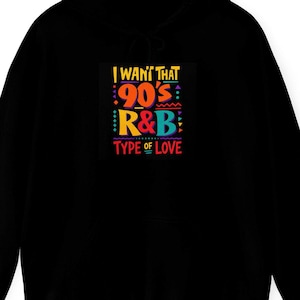 May include: A black hooded sweatshirt featuring a colorful graphic print on the chest. The text reads I WANT THAT 90'S R&B TYPE OF LOVE in yellow, orange, blue, and red lettering, accented with small geometric shapes and patterns in bright colors.