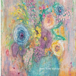 May include: A painting of a bouquet of flowers in a blue vase. The flowers are a mix of purple, pink, yellow, and blue. The background is a light pink and orange.