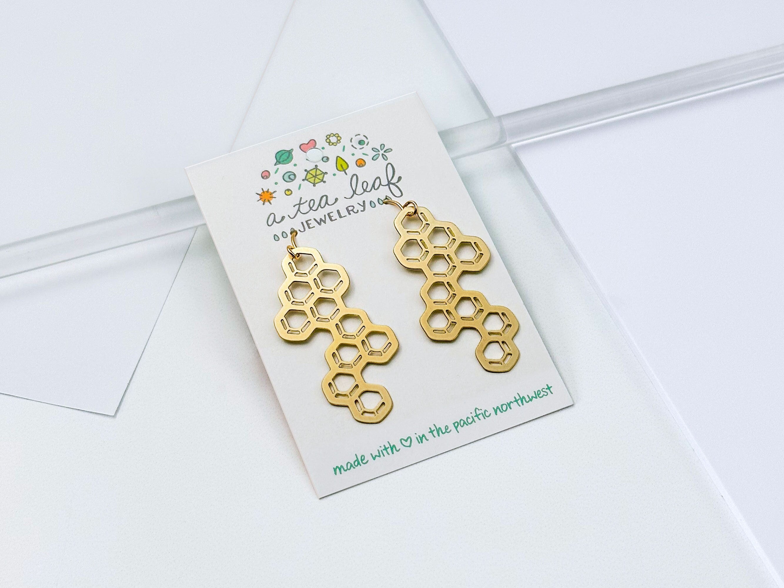 Tea Leaf Charm Huggie Earrings Tea Leaf Charm Huggie Earrings