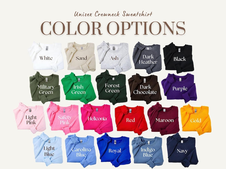Op de afbeelding: Een kleurenkaart met 18 verschillende kleuropties voor een unisex crewneck sweatshirt. De kleuren omvatten wit, zand, as, donkergrijs melange, zwart, legergroen, Iers groen, bosgroen, donker chocolade, paars, lichtroze, veiligheidsroze, heliconia, rood, bordeauxrood, goud, lichtblauw, Carolina blauw, koninklijkblauw, indigo blauw en marineblauw.