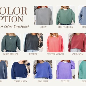 K&ouml;nnte beinhalten: Eine Auswahl an Comfort Colors-Sweatshirts in verschiedenen Farbt&ouml;nen, darunter Grau, Hellgr&uuml;n und Blue Jean. Das Bild zeigt eine Reihe von Farben wie Blaufichte, Pfeffer, Wassermelone, Karmesinrot, Denim, Marineblau, Flo Blue, Violett und Seegr&uuml;n.