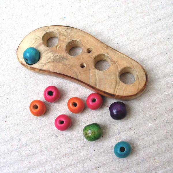 Wooden button with holes for inserting decorations, handmade, one of a kind, natural brown